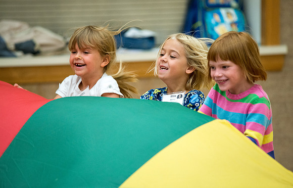 BYU-Idaho Education Week: Strengthening individual and families through lifelong learning. Fun with a parachute.