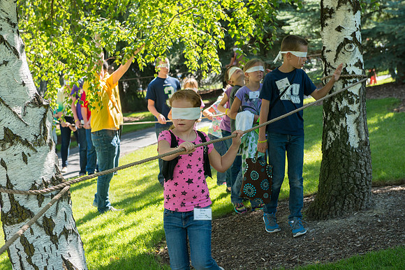 BYU-Idaho Education Week: Strengthening individual and families through lifelong learning. Blindfolded youth experiance "The Tree of Life"