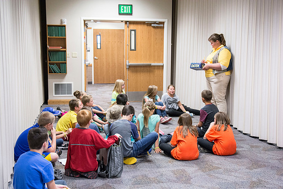 Children participate in games that help build unity and teamwork. Photo by Erik Hill.