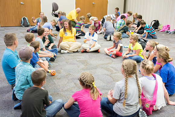 Children participate in games that help build unity and teamwork. Photo by Erik Hill.