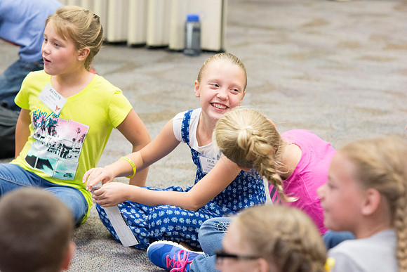 Children participate in games that help build unity and teamwork. Photo by Erik Hill.