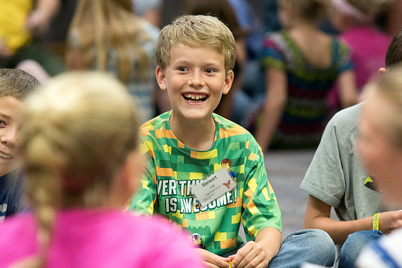 Children participate in games that help build unity and teamwork. Photo by Erik Hill.