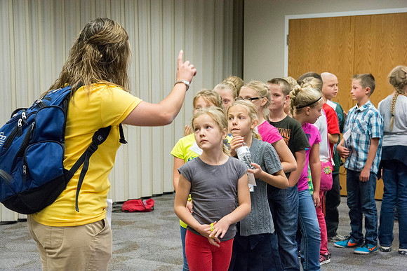 Children participate in games that help build unity and teamwork. Photo by Erik Hill.