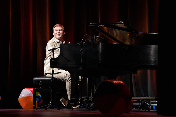 Students participate of the New Student Talent Show in the Hart building.