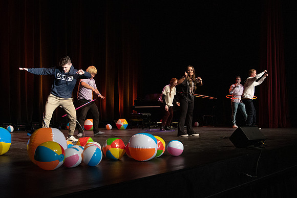 Students participate of the New Student Talent Show in the Hart building.