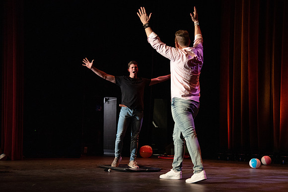 Students participate of the New Student Talent Show in the Hart building.
