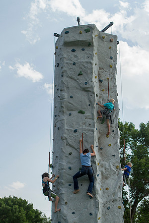 The IT Department, along with family and friends, gather at Porter Park to eat, socialize, and play games.