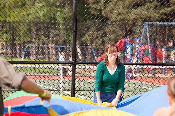 The IT Department, along with family and friends, gather at Porter Park to eat, socialize, and play games.