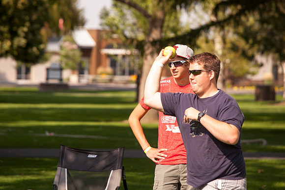 The IT Department, along with family and friends, gather at Porter Park to eat, socialize, and play games.