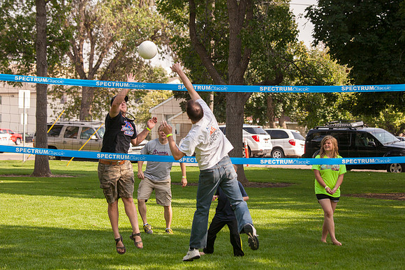 The IT Department, along with family and friends, gather at Porter Park to eat, socialize, and play games.