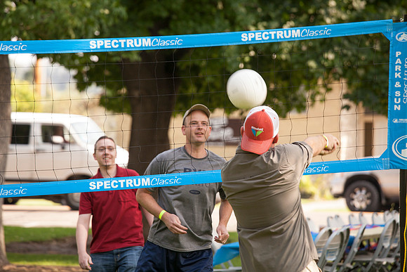 The IT Department, along with family and friends, gather at Porter Park to eat, socialize, and play games.