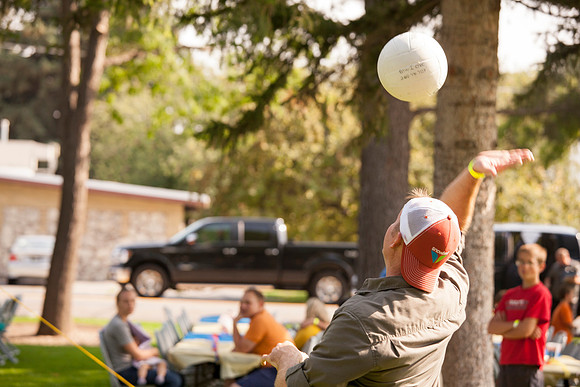 The IT Department, along with family and friends, gather at Porter Park to eat, socialize, and play games.
