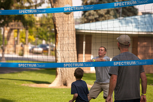 The IT Department, along with family and friends, gather at Porter Park to eat, socialize, and play games.