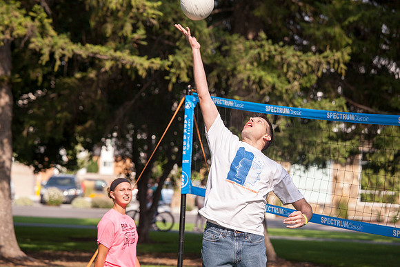 The IT Department, along with family and friends, gather at Porter Park to eat, socialize, and play games.