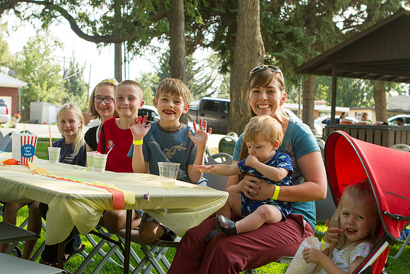 The IT Department, along with family and friends, gather at Porter Park to eat, socialize, and play games.