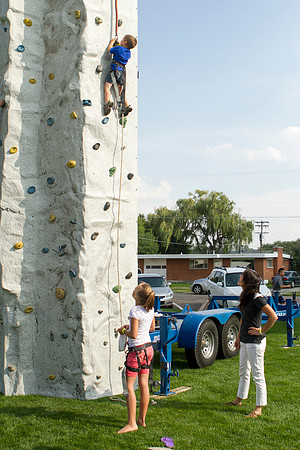 The IT Department, along with family and friends, gather at Porter Park to eat, socialize, and play games.