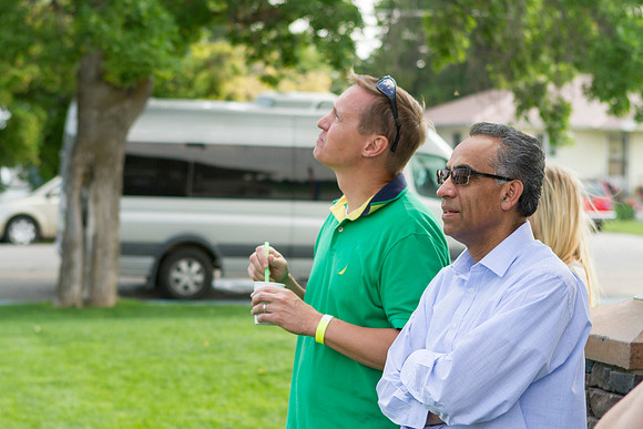 The IT Department, along with family and friends, gather at Porter Park to eat, socialize, and play games.
