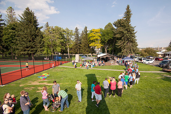 The IT Department, along with family and friends, gather at Porter Park to eat, socialize, and play games.