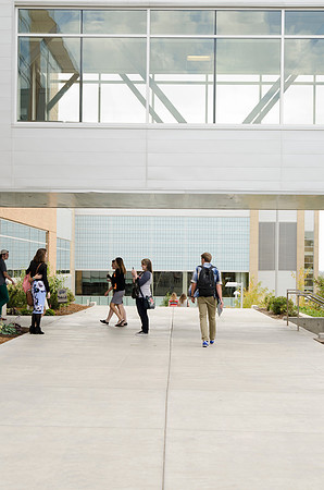 Students walking out on campus after devotional