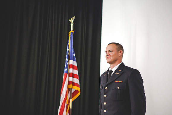 2LT Mathew Skyler Plummer gets his rank pinned on by his wife Kathryn Plummer, and his mother Brenda Plummer.
