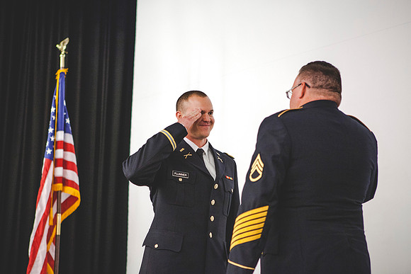 2LT Mathew Skyler Plummer renders his first salute to SSG Tom Plummer, his uncle.