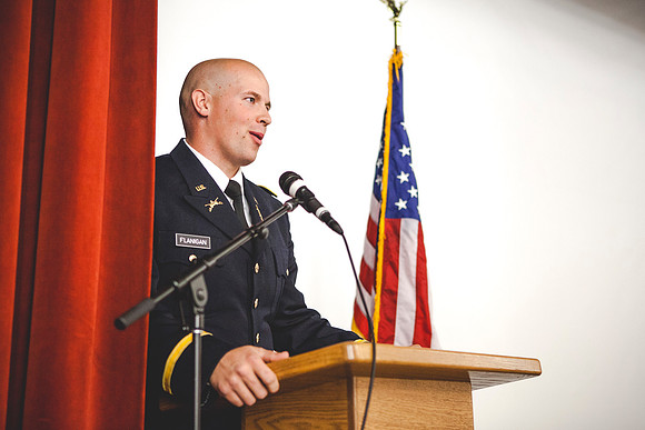 2LT Flanigan gives a few closing remarks after giving his first salute as an officer.