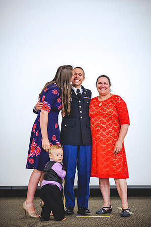 2LT Benjamin Mars gets a surprise kiss from his wife Hannah during the Commissiong Ceremony.
