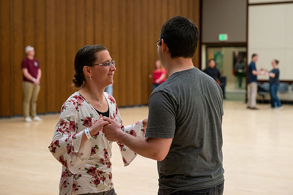 Students learn the basics of Bachata during the weekly social Latin Dance.