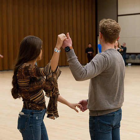 Students learn the basics of Bachata during the weekly social Latin Dance.