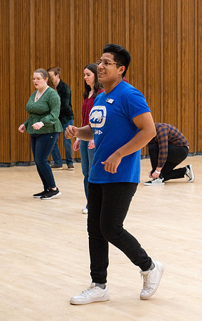 Students learn the basics of Bachata during the weekly social Latin Dance.