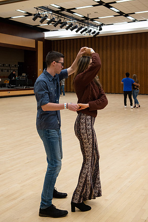 Students learn the basics of Bachata during the weekly social Latin Dance.