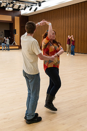 Students learn the basics of Bachata during the weekly social Latin Dance.
