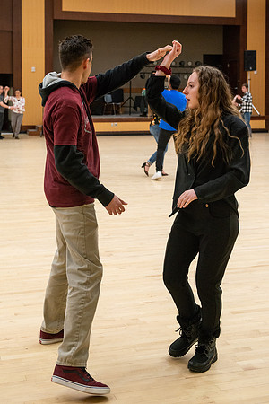 Students learn the basics of Bachata during the weekly social Latin Dance.