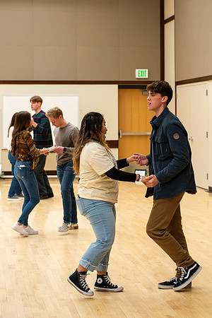 Students learn the basics of Bachata during the weekly social Latin Dance.