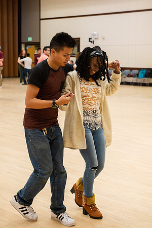 Students learn the basics of Bachata during the weekly social Latin Dance.