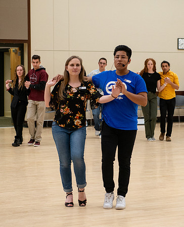 Students learn the basics of Bachata during the weekly social Latin Dance.