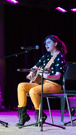 Students share their talents and perform during Open Mic Night in the MC Crossroads.