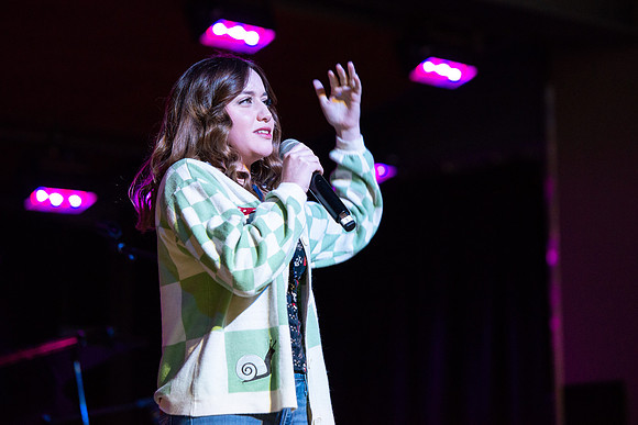Students share their talents and perform during Open Mic Night in the MC Crossroads.