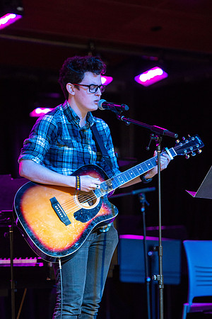 Students share their talents and perform during Open Mic Night in the MC Crossroads.