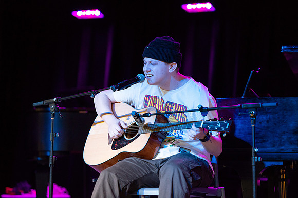 Students share their talents and perform during Open Mic Night in the MC Crossroads.
