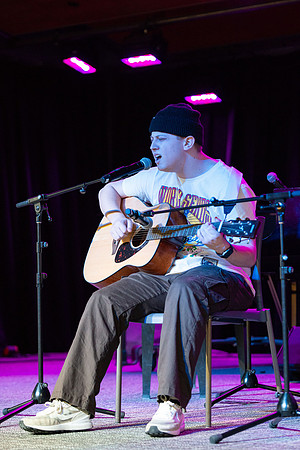Students share their talents and perform during Open Mic Night in the MC Crossroads.