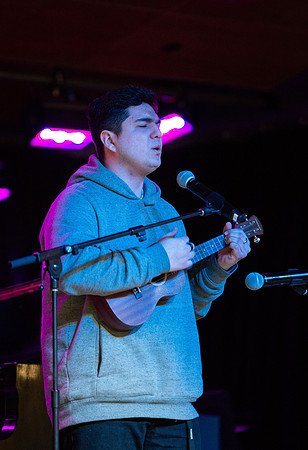 Students share their talents and perform during Open Mic Night in the MC Crossroads.