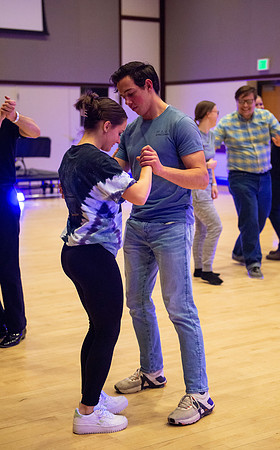 Students learn the basics of Ballroom and Swing Dance during the weekly social dance in the Manwaring Center.