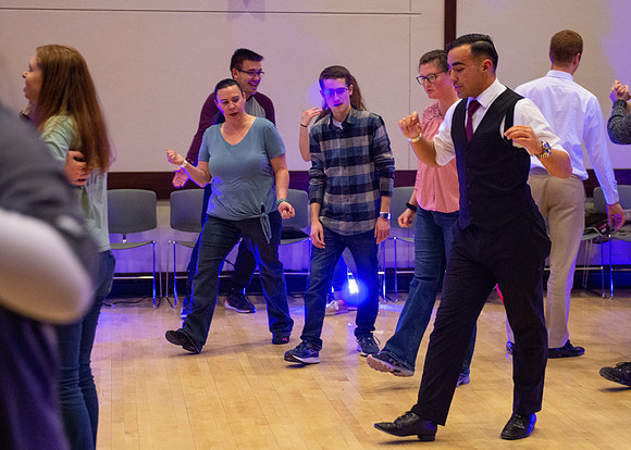 Students learn the basics of Ballroom and Swing Dance during the weekly social dance in the Manwaring Center.