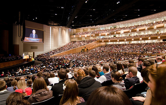 The BYU-Idaho Center auditorium is filled nearly to capacity for devotional with students eager listen to Elder L Tom Perry, an Apostle to the Lord Jesus Christ.