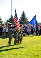 Students gather at the upper field for various 4th of July activities.