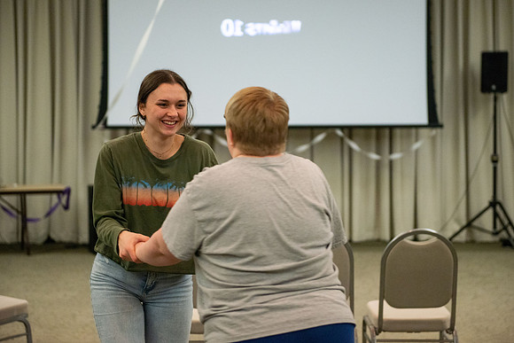 Students celebrate winter with karaoke, dancing, and games in the Manwaring Center.