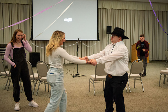 Students celebrate winter with karaoke, dancing, and games in the Manwaring Center.