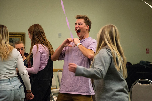 Students celebrate winter with karaoke, dancing, and games in the Manwaring Center.