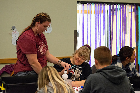 Students celebrate winter with karaoke, dancing, and games in the Manwaring Center.